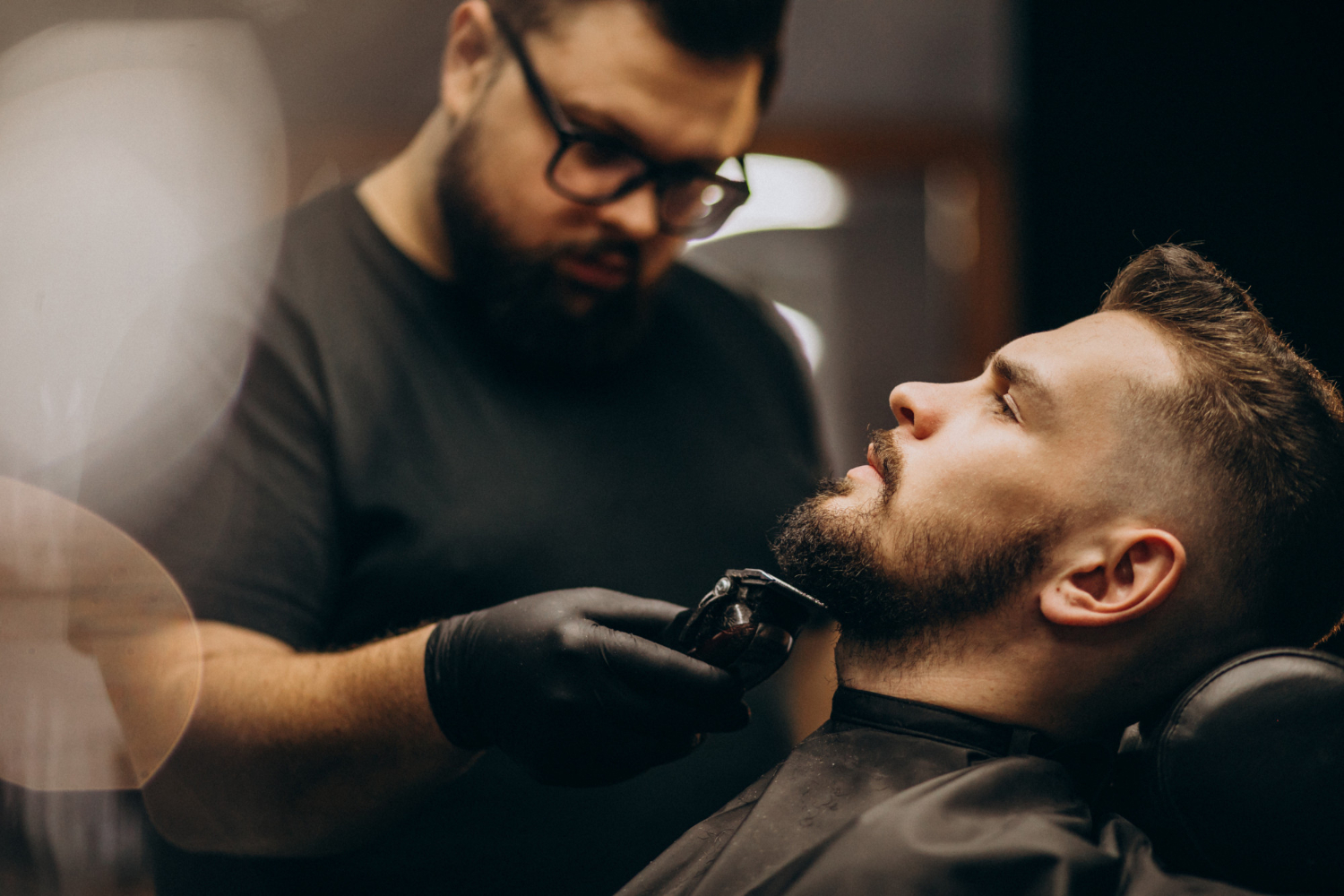 handsome-man-cutting-beard-barber-shop-hair-salon